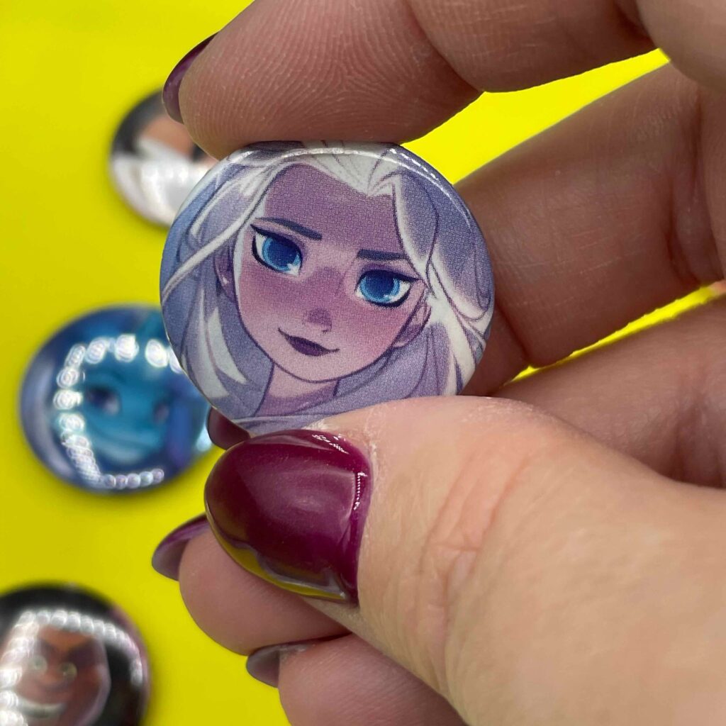 Booster Lorcana macaron 1 pouce