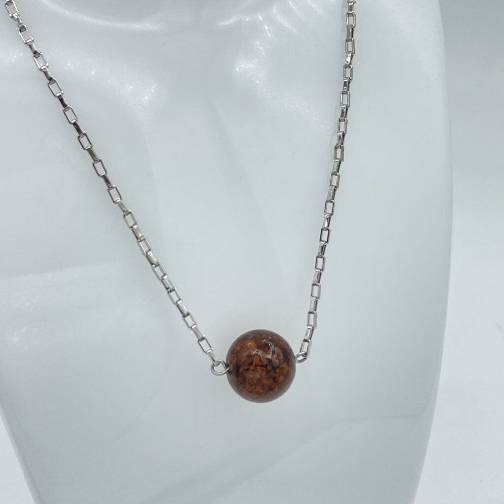 Sphère de verre cuivrée